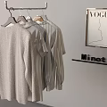 Clothes Hanger Holding Light Gray Sweaters And Striped Shirts With VOGUE Poster And Minotti Sign