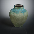 Textured Ceramic Vase With Greenish Body And Blue Drip Glaze Finish