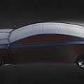 Silver Sports Car With Sleek Body Design And Unique Wheel Rims In Modern Futuristic Style