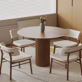Round Wooden Dining Table Set with Four Chairs Flower Vase and Window Natural Light