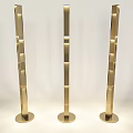 Three Golden Floor Lamps with Modern Column Design and Stacked Structure