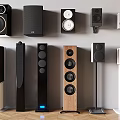 Different Styles of Home Audio Speakers Including Floor Standing and Wall Mounted Designs