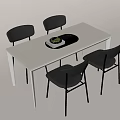 Modern Rectangular White Dining Table Set with Four Black Chairs Tray and Green Plant 3d model