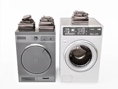 Two Front Load Washing Machines Gray And Silver With Folded Clothes On Top 3d model