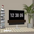 Modern TV with Soundbar on Patterned Rug Near Book Stack and Potted Plant
