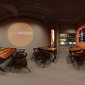 Red Brick Cafe Storefront Featuring Glass Windows Signboard Tables Chairs Inside At Night Plaza Streetlights