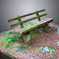 Old Wooden Moss Covered Outdoor Bench Surrounded by Grass Fallen Leaves and Stones