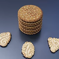 Golden Stack of Round Cookies with Decorative Patterns and Assorted Shapes on Dark Background