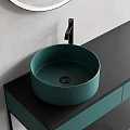 Modern Bathroom Washbasin Vanity With Round Mirror Green Basin And Black Countertop
