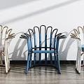 Modern Leisure Chairs With Wicker Backrest Beige And Blue Cushions And Sunlight Shadows