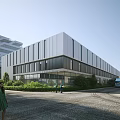 Modern Industrial Factory Building Exterior With Large Glass Windows Greenery Pedestrians On Cobblestone Road