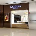 GODIVA Storefront Design With Black Facade Elegant Signage And Interior Display Counters