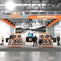 Modern Exhibition Booth With Displayed Tires Orange Gray Design Lighting And Screen