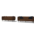 Modern two-seater sofa in brown with light brown and dark blue cushions and black legs