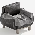 Modern Minimalist Gray Armchair With Soft Fabric Blanket And Wooden Legs