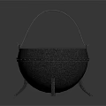 Black Cast Iron Cauldron With Metal Handle And Three Legs Design