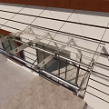 Modern Glass Canopy For Building Entrance With Metal Brackets And White Wall Panels