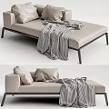 Modern Beige Chaise Lounge with Plush Pillows Checkered Blanket and Metal Legs