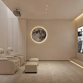 Modern Home Theater Interior with Beige Leather Recliners Circular Moon Decor and Large Screen TV