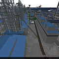 Large Scale Industrial Plant With Piping Systems Buildings Surrounding River And Roads