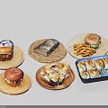 Assorted Delicious Food Selection On Wooden Plates Featuring Hamburgers Bread Fries And Rolls