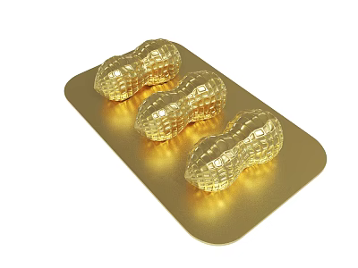 Three Shiny Golden Peanut Shaped Objects Arranged On Gold Tray 3d model