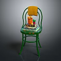 Green Chair With Yellow Towel Stack of Books Basket Oranges And Small Potted Plant