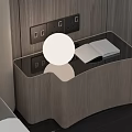 Modern Wooden Nightstand In Bedroom Interior With Open Book And White Round Lamp