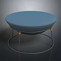 Round Blue Padded Stool With Metal Frame Circular Base And Orange Accents