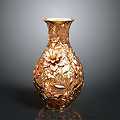 Golden Carved Vase With Intricate Floral Patterns And Decorative Details