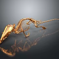 Golden Mouse Skeleton Display With Detailed Structure On Black Background And Reflection