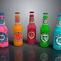 Colorful Glass Bottles Display With Pink Orange Red Green Blue Labels And Logos