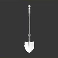 White Metal Shovel With Long Handle And Reflective Blade On Dark Surface