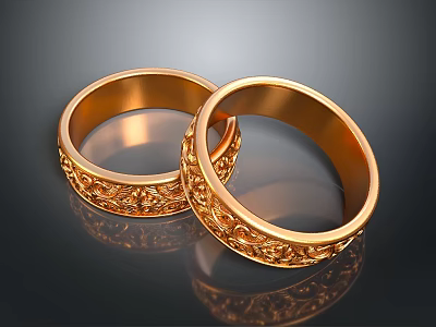 Ornate Gold Rings With Intricate Engraved Patterns And Shiny Finish 3d model