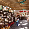 Traditional Style Store Interior With Wooden Shelves Red Lanterns Ceiling Fans and Customers Shopping