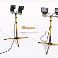 Portable Spotlights With Yellow Black Tripod Stands And Power Cords
