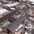Aerial View Of Industrial Landscape With Factories Warehouses Vehicles And Equipment