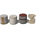 Four Unique Modern Ottoman Designs with Various Materials and Shapes