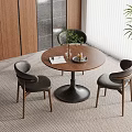 Cozy Dining Space Interior With Round Wooden Table Three Dark Chairs Wooden Cabinets And Window