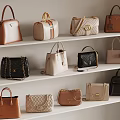 Fashionable Handbags Collection Arranged On White Shelves With Various Styles And Colors