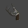 Spiked Mechanical Claw Weapon Featuring Metal Construction And Red Gem Accent 3d model