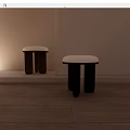 Modern Minimalist Stools With Upholstered Seats Brown And Black Wooden Legs In Soft Light Interior