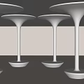 Four White Bell Shaped Columns With Circular Base And Wide Top In Sleek Modern Design