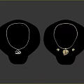 Fashionable Gold Necklaces With Teardrop And Leaf Shaped Pendants On Mannequin Displays