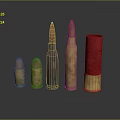Assorted Bullet Sizes In Metallic And Red Casings On Dark Surface