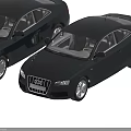 Two Black Audi Cars With Modern Design And Front Grille Details