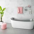 White Bathtub With Gray Wall Pink Towel Silver Towel Rack Green Plant And Pink Stool