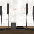 Stylish Home Audio System With Tall Floor Standing Speakers Subwoofer And Brick Wall Design