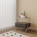 Modern Bedroom Nightstand with Metal Frame and Black Drawer holding Vase Cup and Book