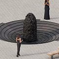 Rustic Stone And Wood Garden Feature With Concentric Circular Ground Patterns